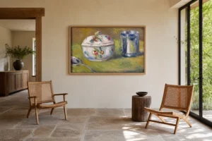 Framed print of Sugar Bowl and Silver Cup hanging on a wall in a furnished room