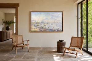 Framed print of The Bay of Naples hanging on a wall in a furnished room