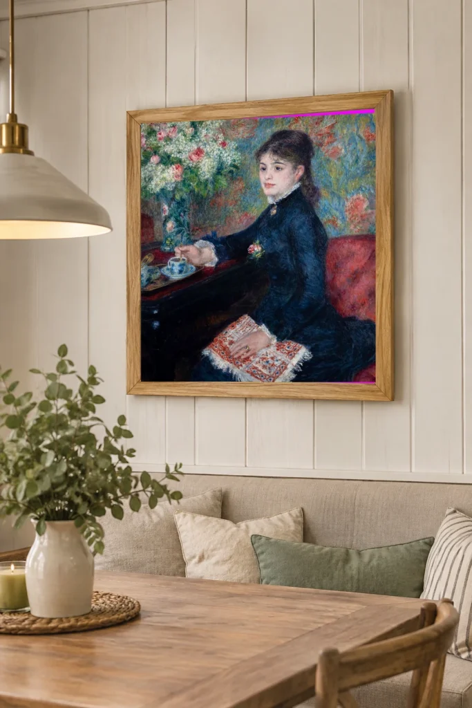 Framed print of The Cup of Chocolate hanging on a wall in a furnished room