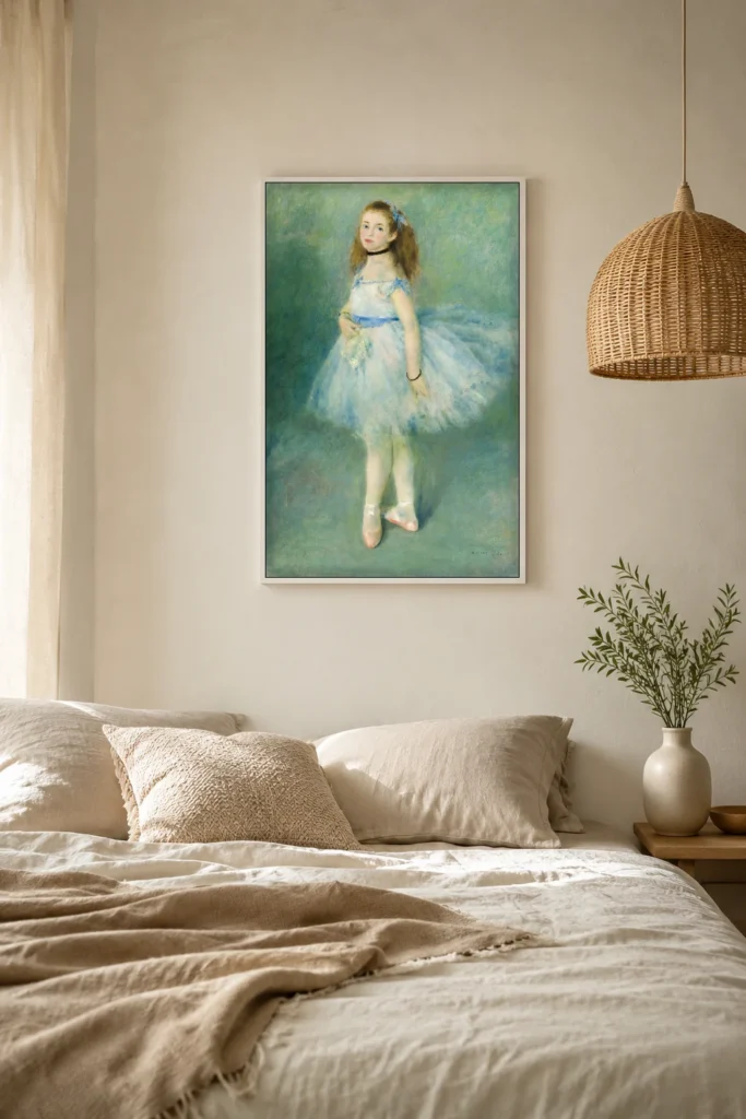 Framed print of The Dancer hanging on a wall in a furnished room