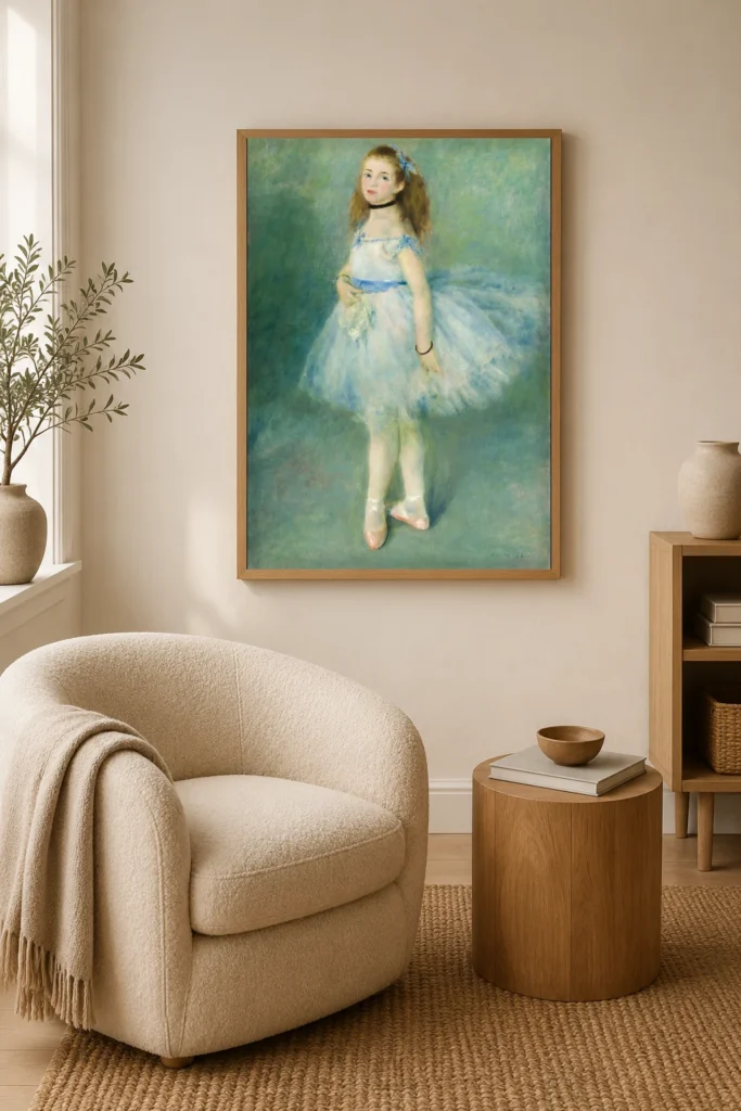 Framed print of The Dancer hanging on a wall in a furnished room