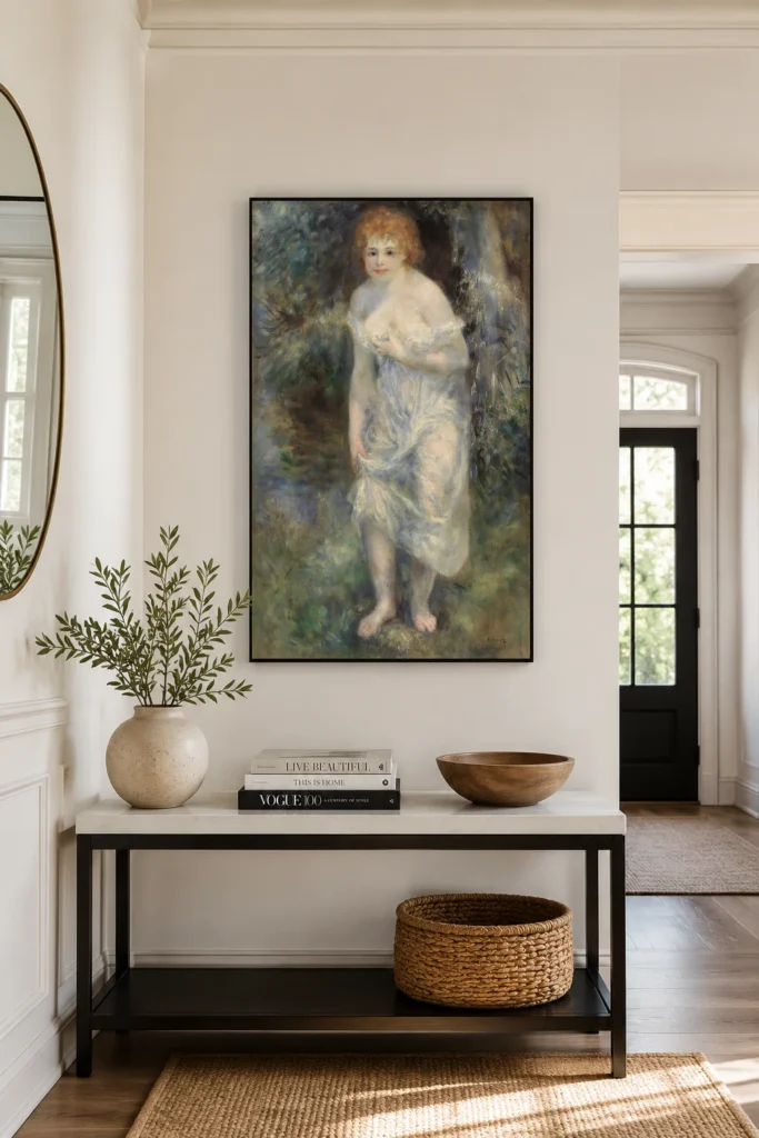 Framed print of The Source (La Source) hanging on a wall in a furnished room