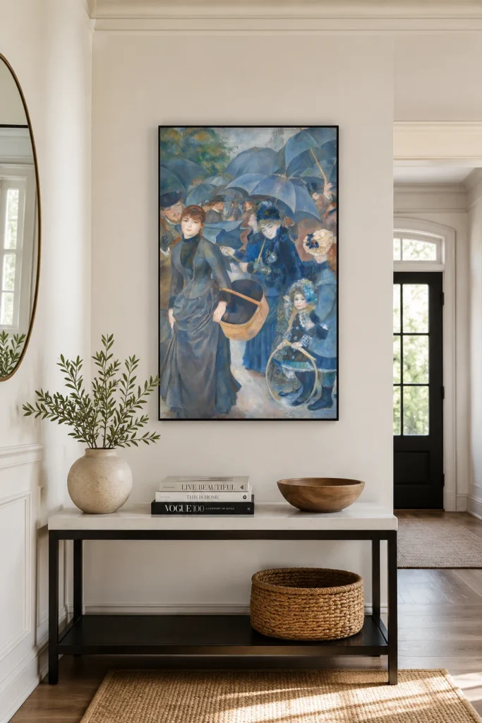 Framed print of The Umbrellas hanging on a wall in a furnished room