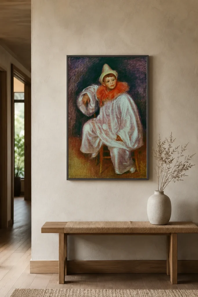 Framed print of The White Pierrot hanging on a wall in a furnished room