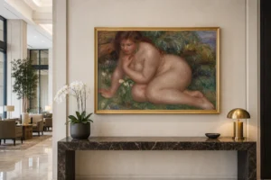Framed print of Bather Gazing at Herself in the Water (Baigneuse se mirant dans l’eau) hanging on a wall in a furnished room