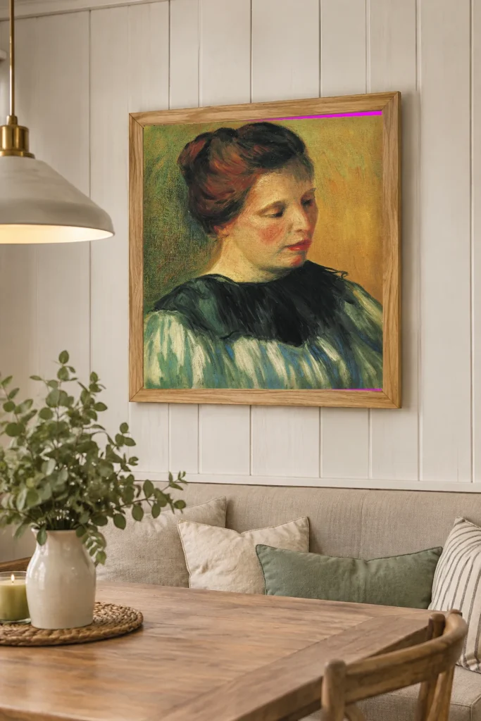 Framed print of Head of a Woman (Young Woman with a Chignon) hanging on a wall in a furnished room