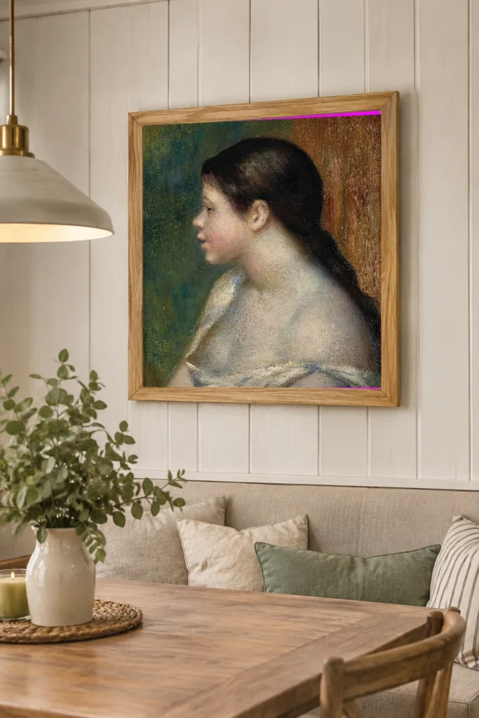 Framed print of Head of a Young Girl on Green and Ochre Background hanging on a wall in a furnished room