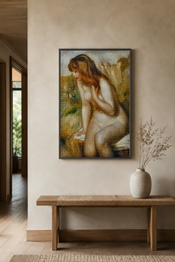 Framed print of Bather on a Rock hanging on a wall in a furnished room