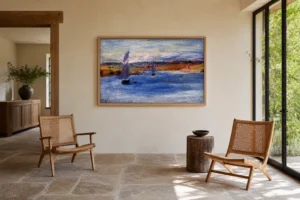Framed print of Sailboats hanging on a wall in a furnished room