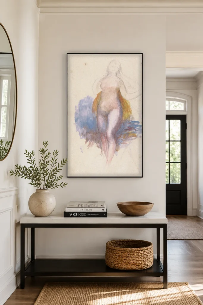 Framed print of Venus hanging on a wall in a furnished room