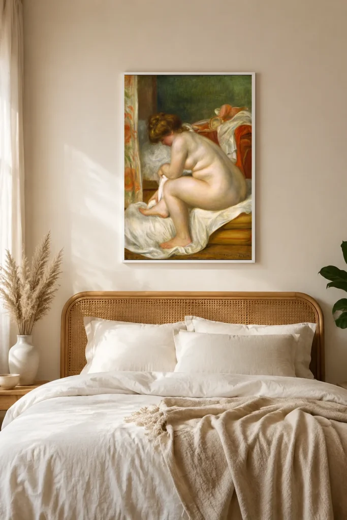 Framed print of Woman After Bath hanging on a wall in a furnished room