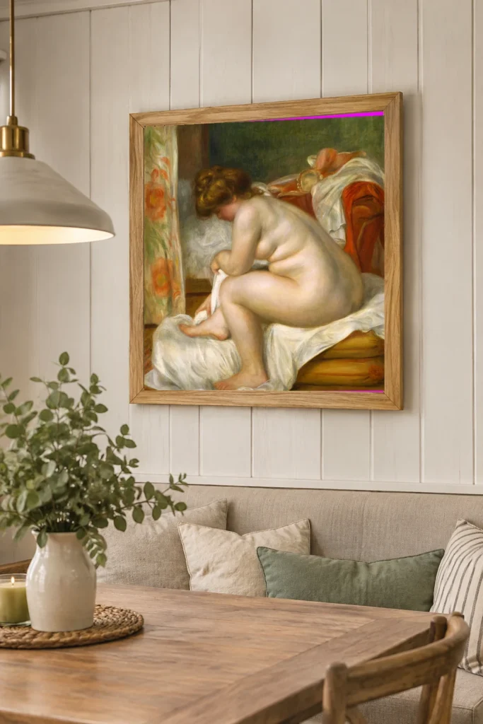 Framed print of Woman After Bath hanging on a wall in a furnished room