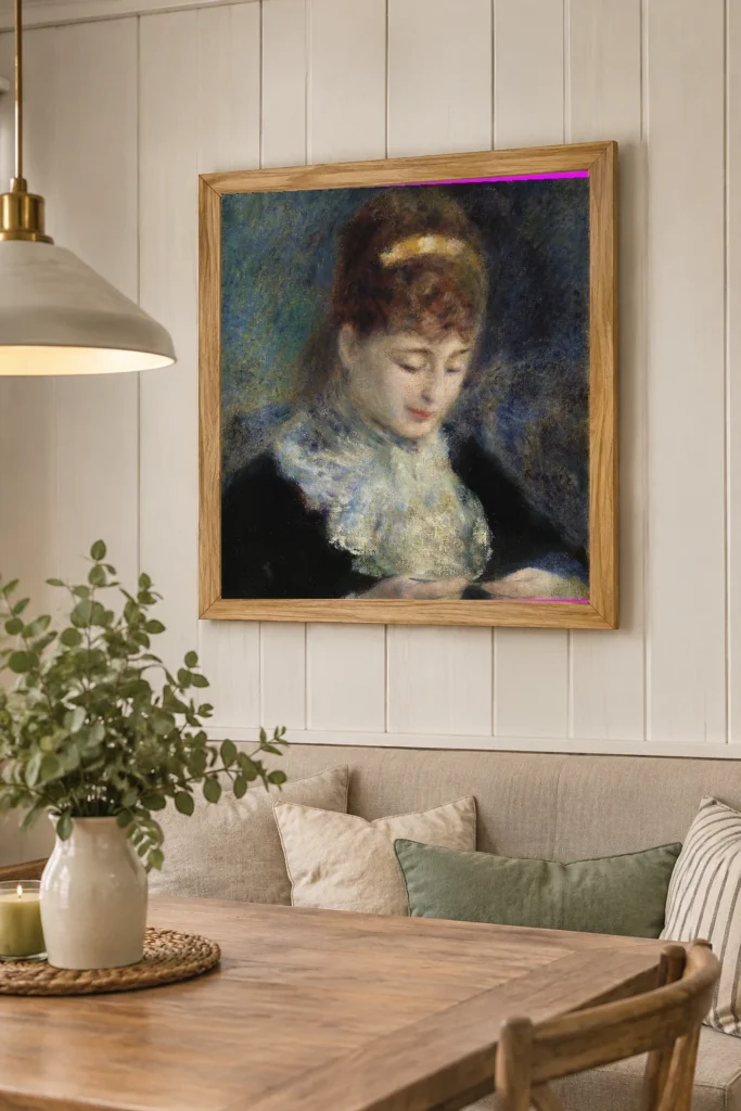 Framed print of Woman Crocheting (Femme faisant du crochet) hanging on a wall in a furnished room