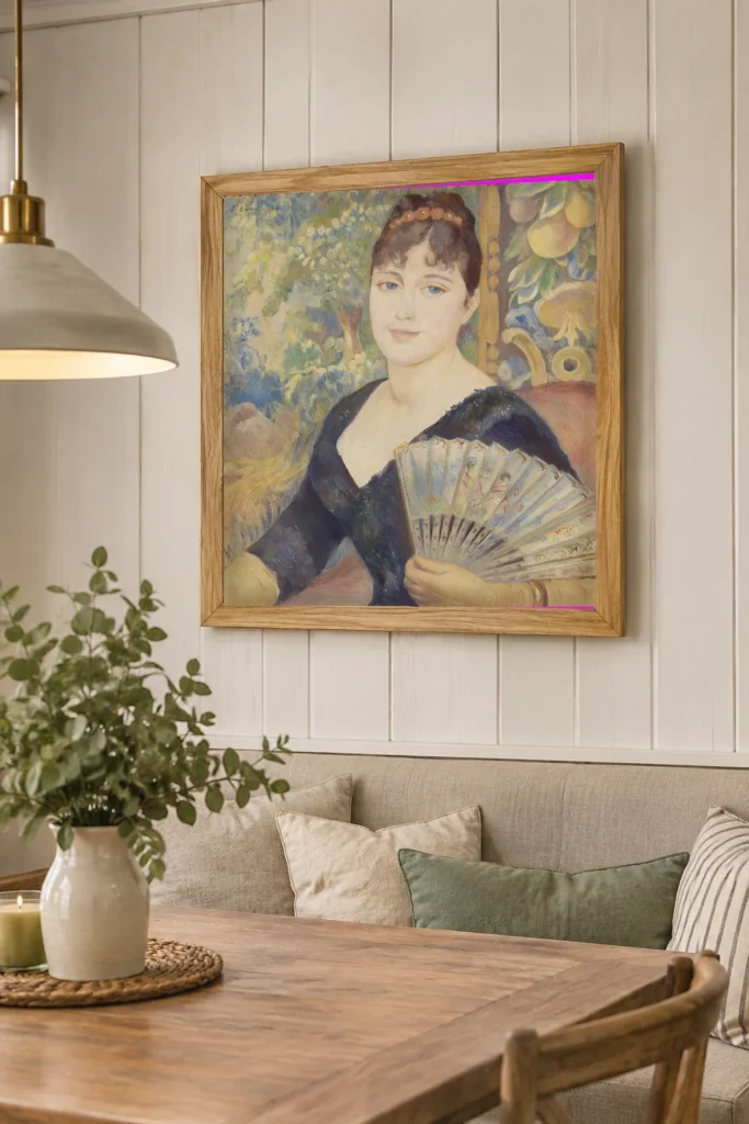 Framed print of Woman with Fan (Femme à l’éventail) hanging on a wall in a furnished room