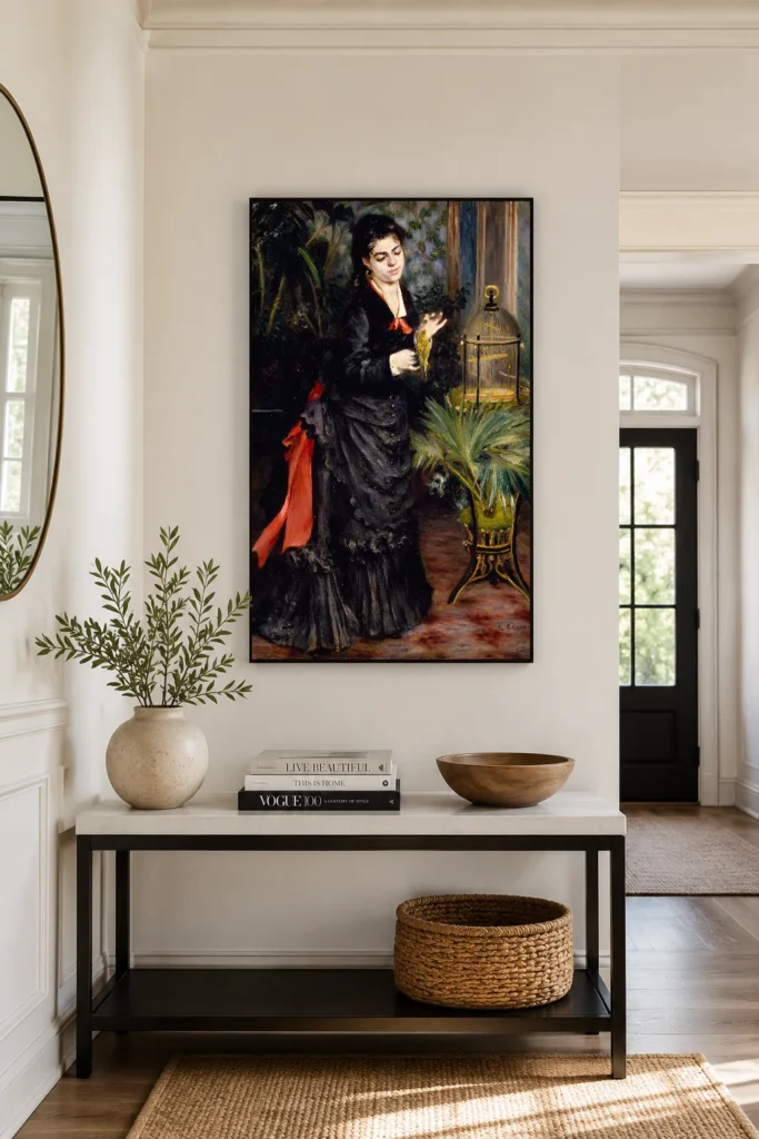 Framed print of Woman with Parrot hanging on a wall in a furnished room