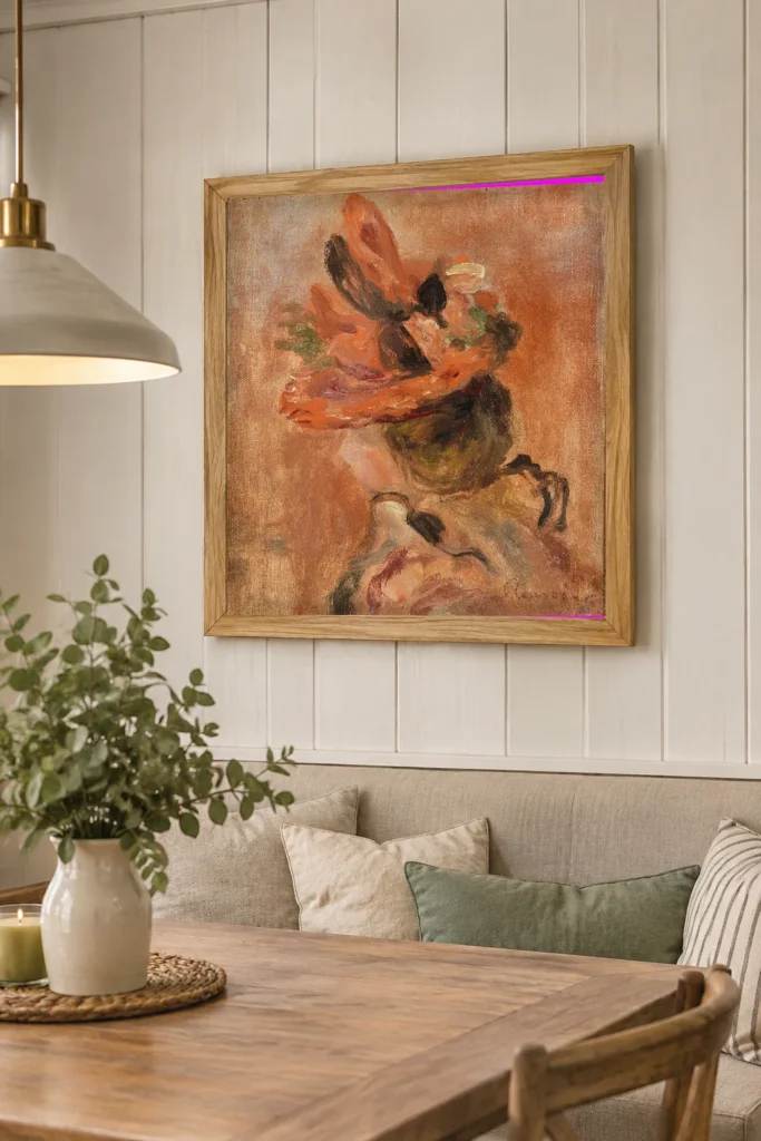 Framed print of Woman’s Head with Red Hat hanging on a wall in a furnished room