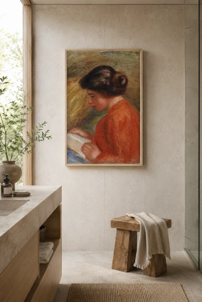 Framed print of Young Woman Reading (Jeune femme lisant, buste) hanging on a wall in a furnished room