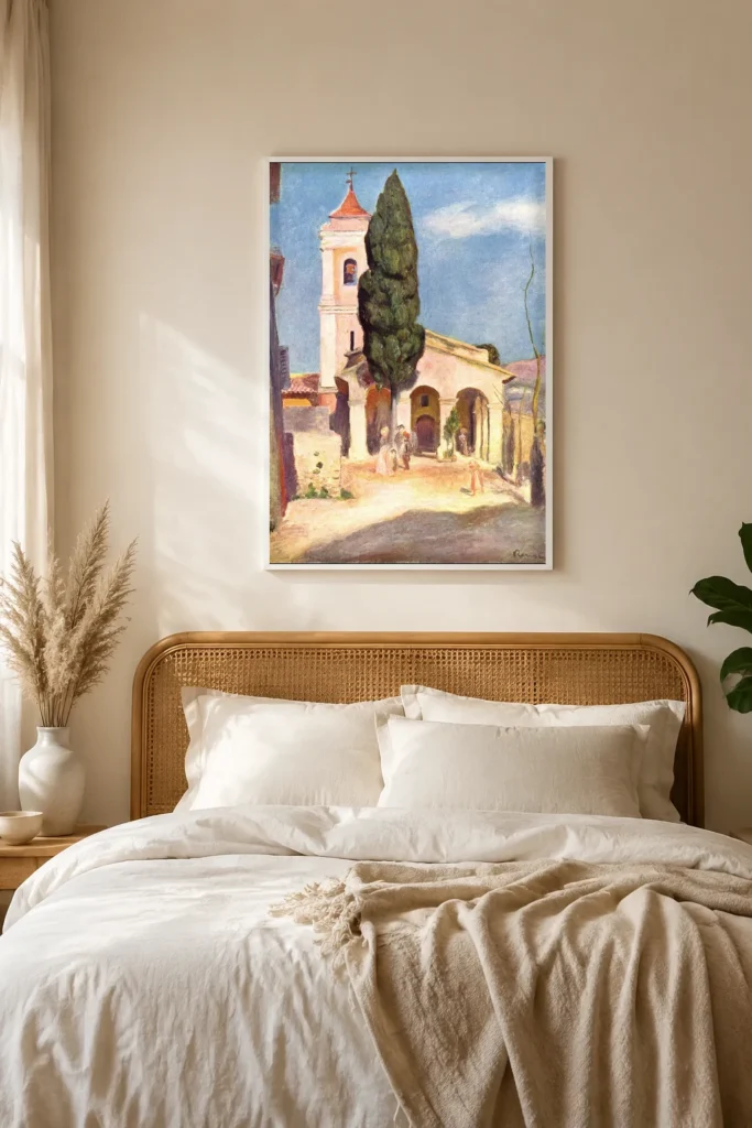 Framed print of Church at Cagnes hanging on a wall in a furnished room