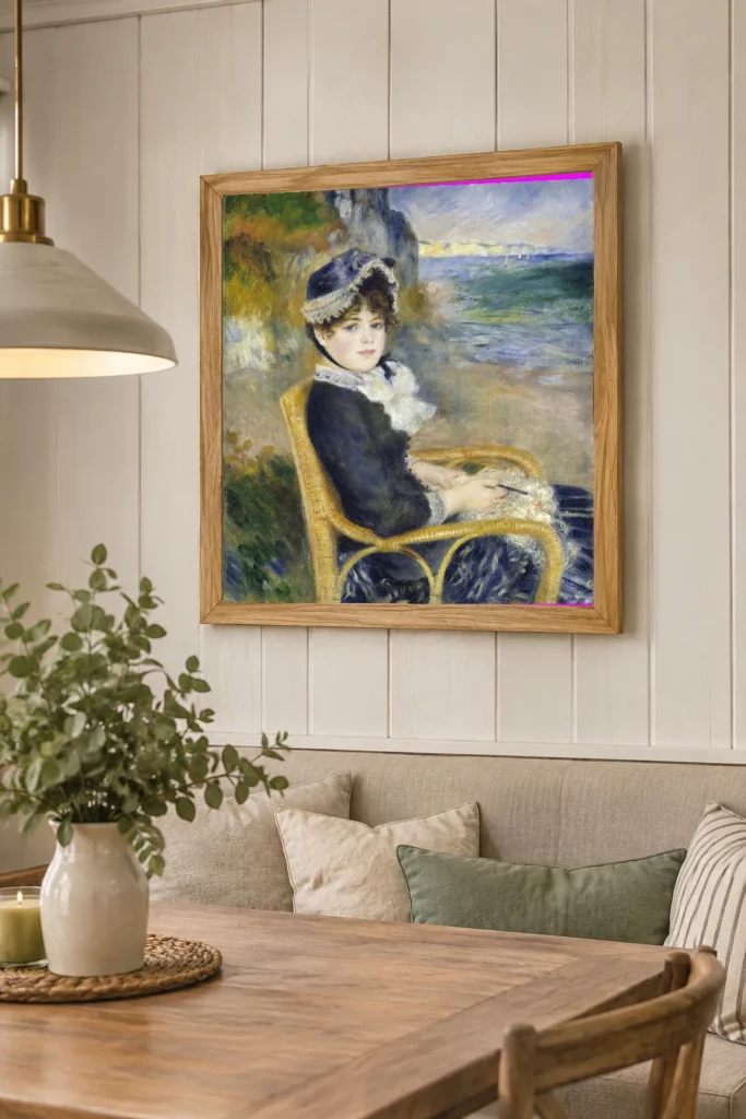 Framed print of By the Seashore hanging on a wall in a furnished room