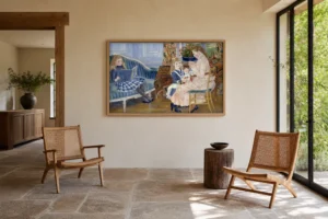 Framed print of Children’s Afternoon at Wargemont hanging on a wall in a furnished room