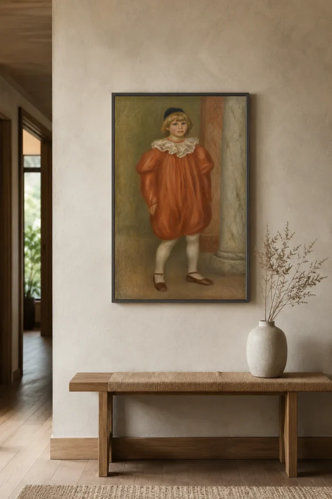 Framed print of Claude Renoir as a Clown hanging on a wall in a furnished room