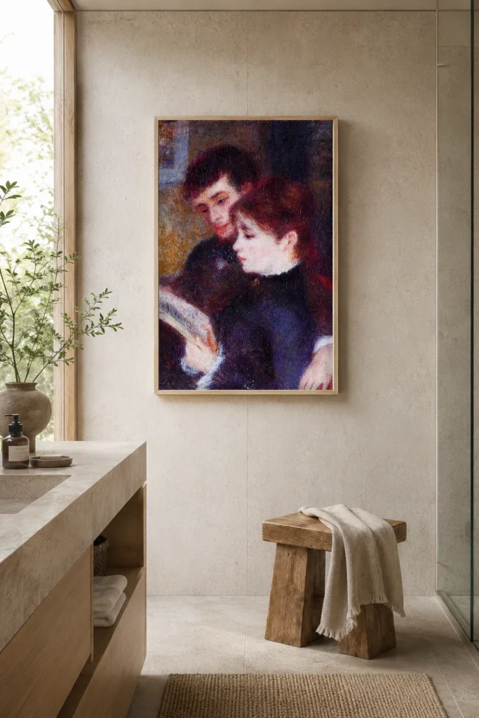 Framed print of Couple Reading hanging on a wall in a furnished room