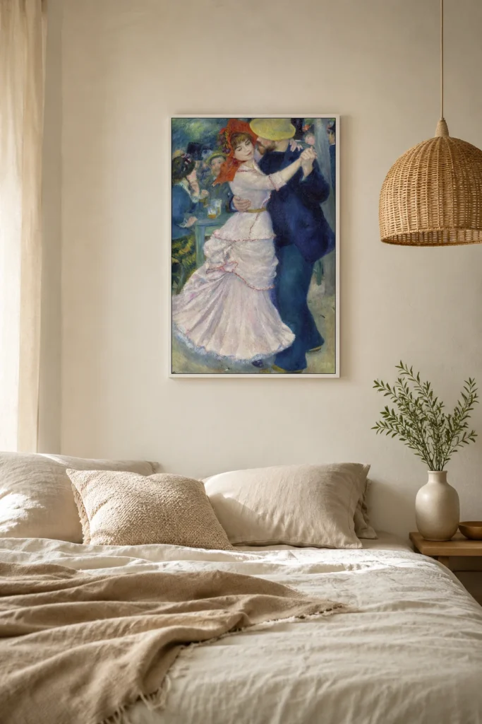 Framed print of Dance at Bougival hanging on a wall in a furnished room