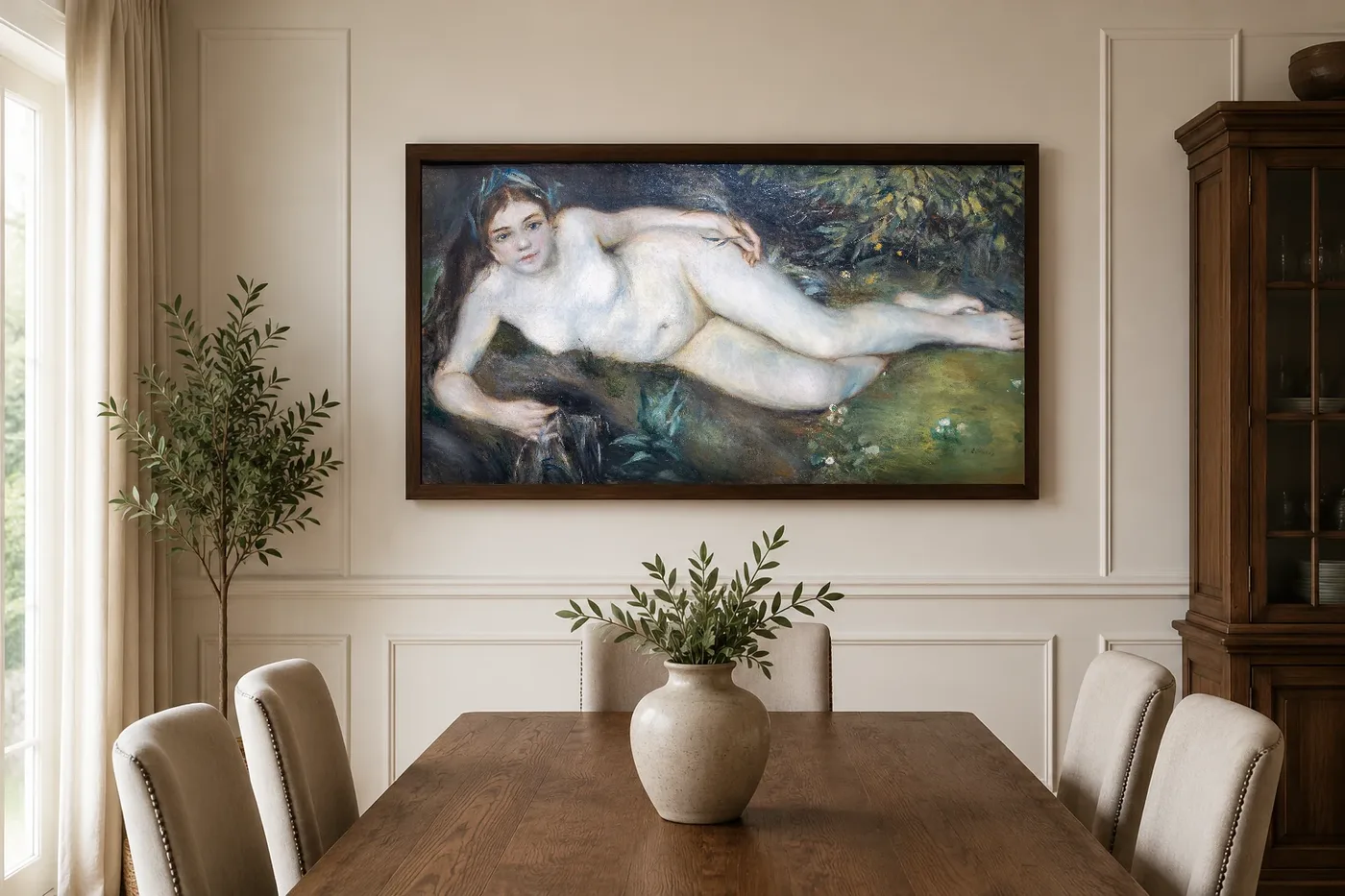 Framed print of A Nymph by a Stream hanging on a wall in a furnished room