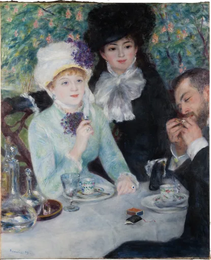 Two seated women in feathered hats and a man lighting a cigarette at a white table set with coffee cups and decanters, in a leafy garden