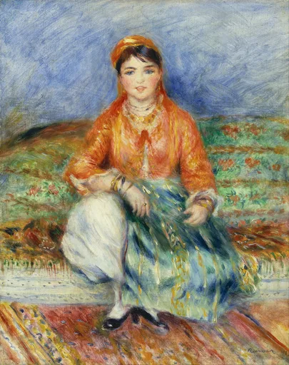 A girl in an orange jacket and headscarf sits cross legged on a patterned rug, wearing full white trousers and gold bangles, in orange, blue and green