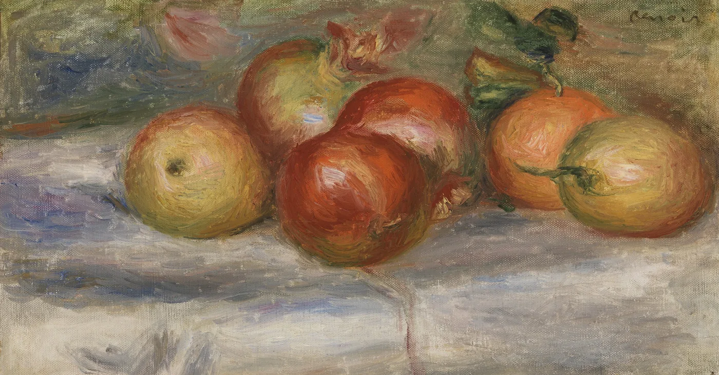 Apples and an orange clustered on a white cloth beside a garden setting, in red, gold and green tones