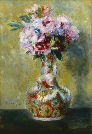 Loose pink, white and red roses spill from a mottled ceramic vase on a dark table against a golden-yellow textured background.
