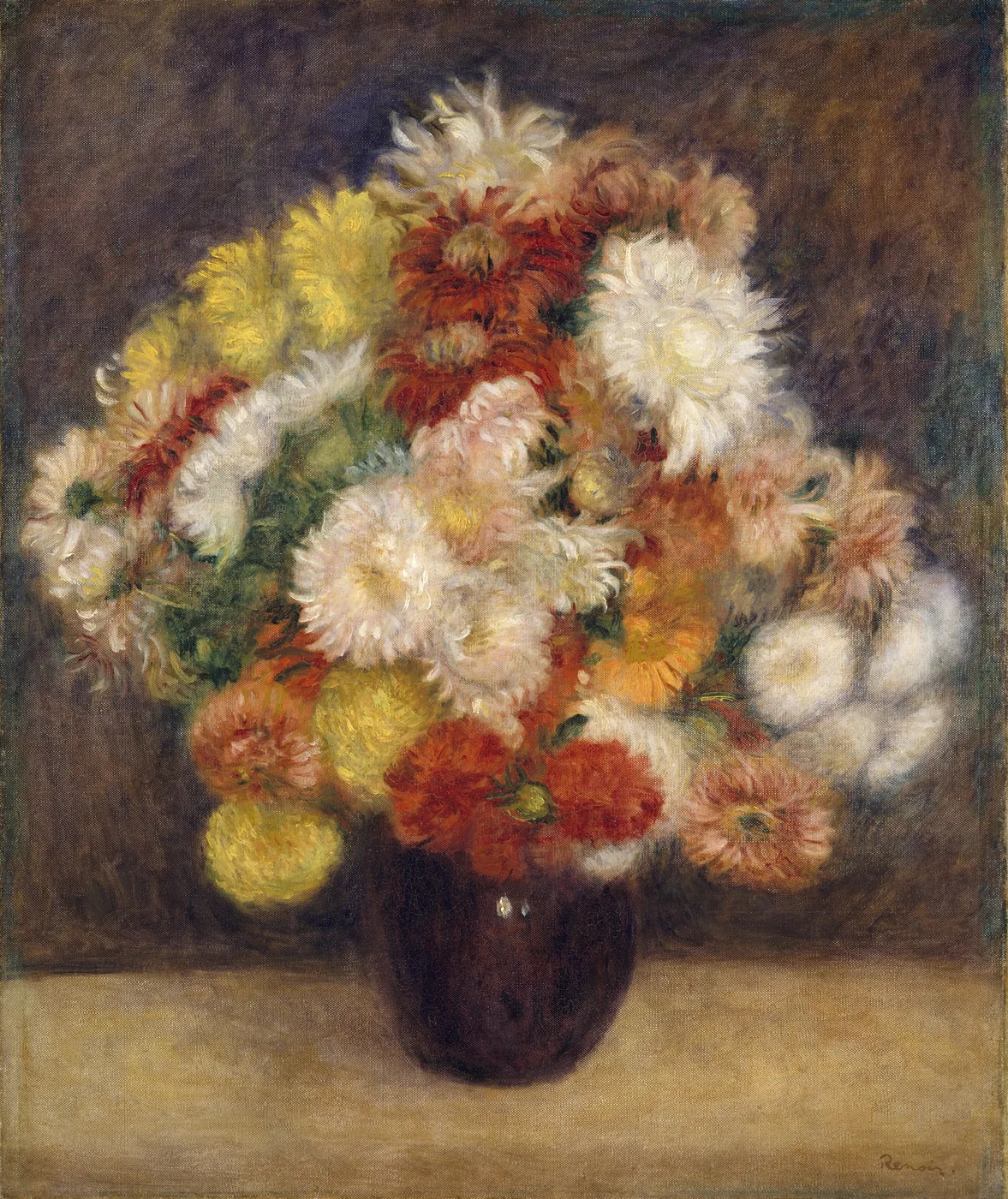A dense bouquet of shaggy chrysanthemums in a dark round vase on a table, in white, yellow and rust orange against a dark brown backdrop