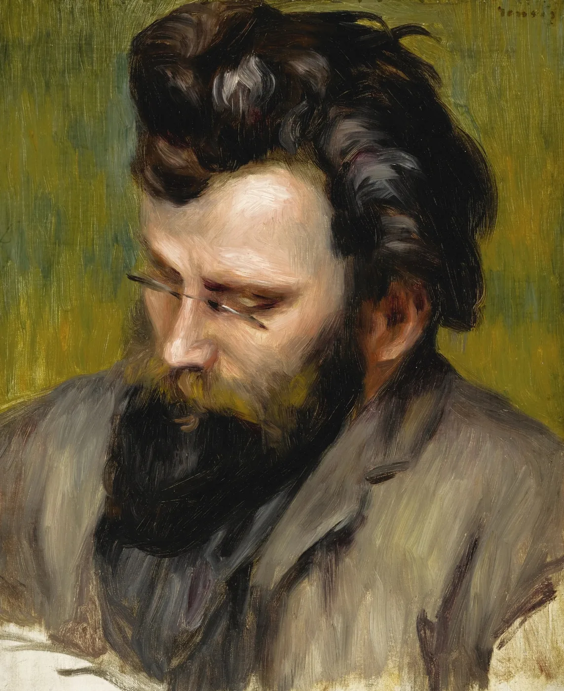 A bearded man with tousled dark hair looking downward, in a grey jacket against an olive green background