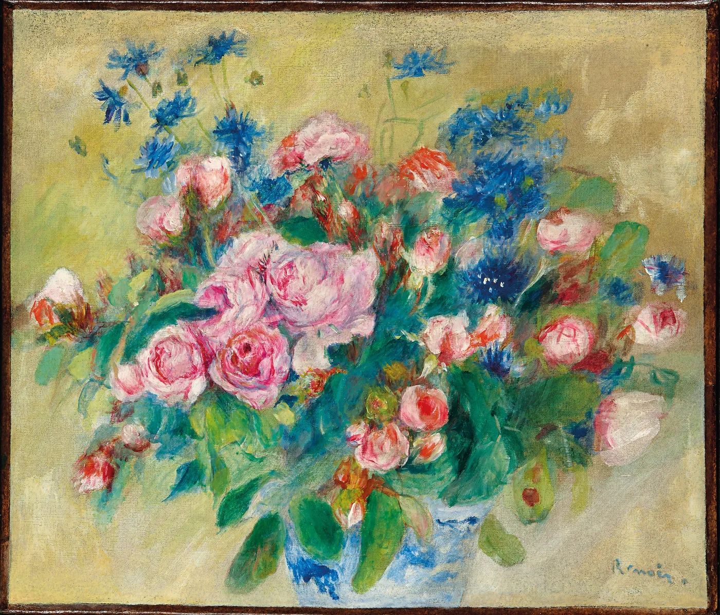 Pink roses and blue cornflowers in a lush bouquet with green foliage, set against a soft yellow background