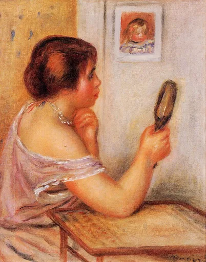 A bare-shouldered woman with a pearl necklace holds up a hand mirror beneath a framed portrait of a child, in peach and cream tones