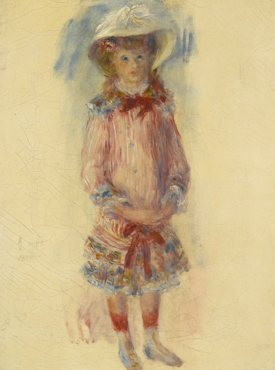 A young girl in a wide white hat and pink dress with a red sash, standing full length against an unfinished cream background