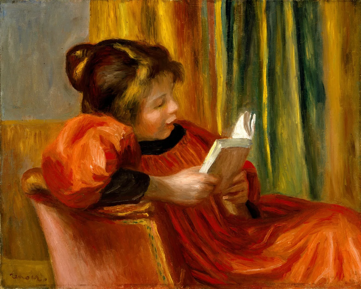 A young woman in a red dress reclining in an armchair, absorbed in reading a book, against striped yellow and green curtains