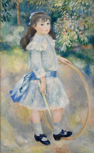 A girl in a blue-trimmed white dress holding a wooden hoop and stick in a flowering garden