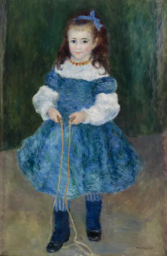 A young girl in a full blue dress and dark boots holding a jump rope, standing full length against a dark green background