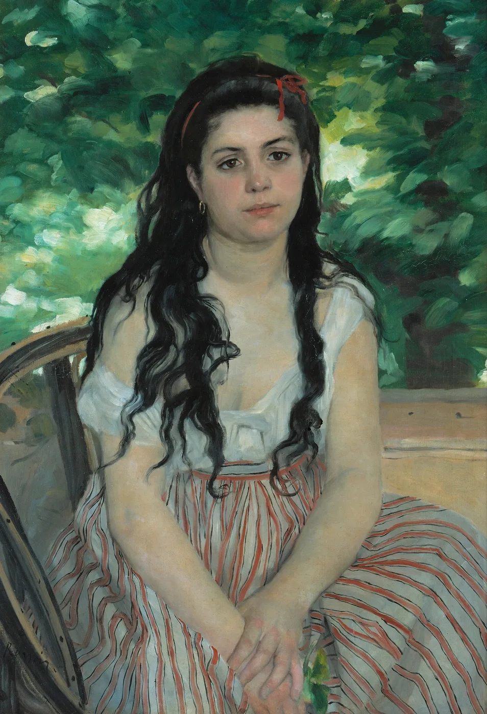 A young woman with long dark hair and a red ribbon sits before a leafy green garden in a white and striped dress