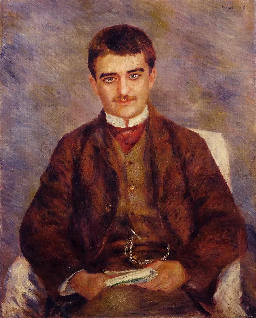 A mustached young man in a brown suit holds papers in his lap, seated against a grey-blue background.