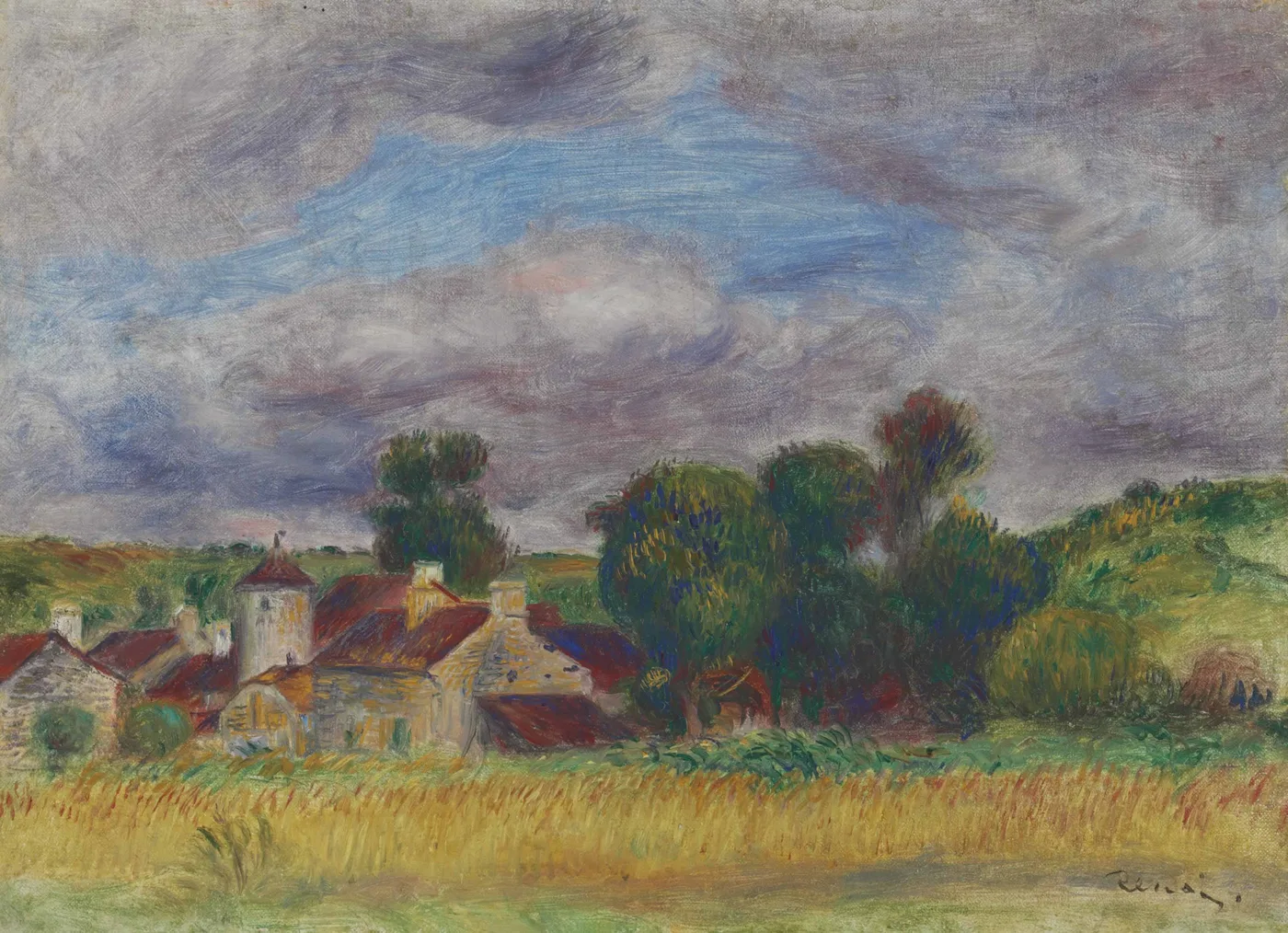 Red-roofed village houses and a small tower nestle among trees beyond a golden field, under a dramatic overcast sky.