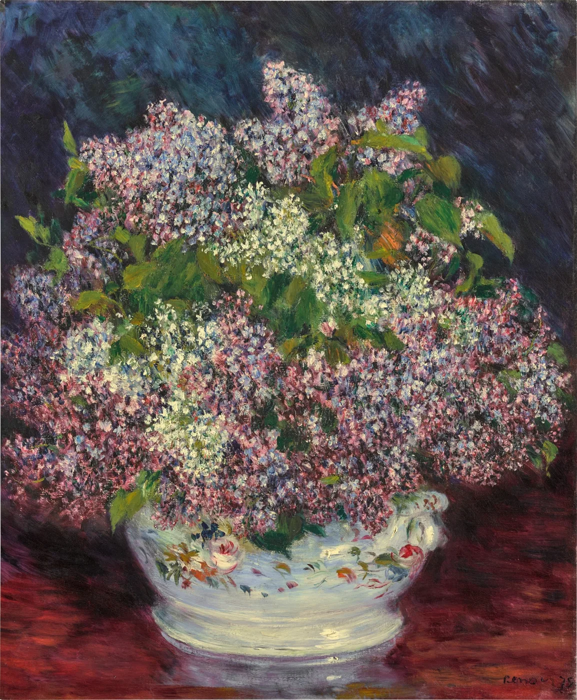 An overflowing bouquet of pink and white lilacs in a white bowl, set against a dark blue background