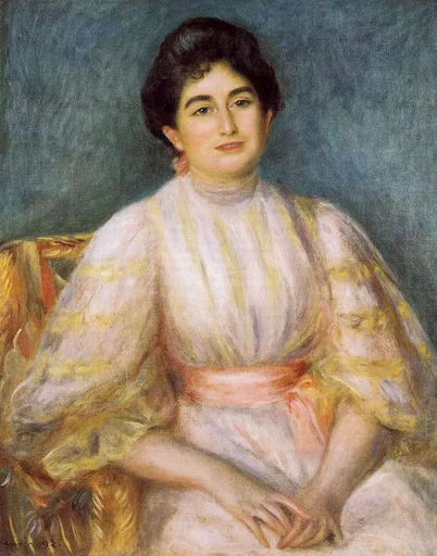 A dark-haired woman in a cream dress with a coral sash sits in a gold-striped chair, against blue-grey.
