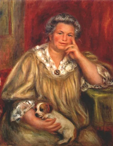 Gray-haired woman in a mustard dress with lace collar rests her chin on her hand while cradling a small puppy.