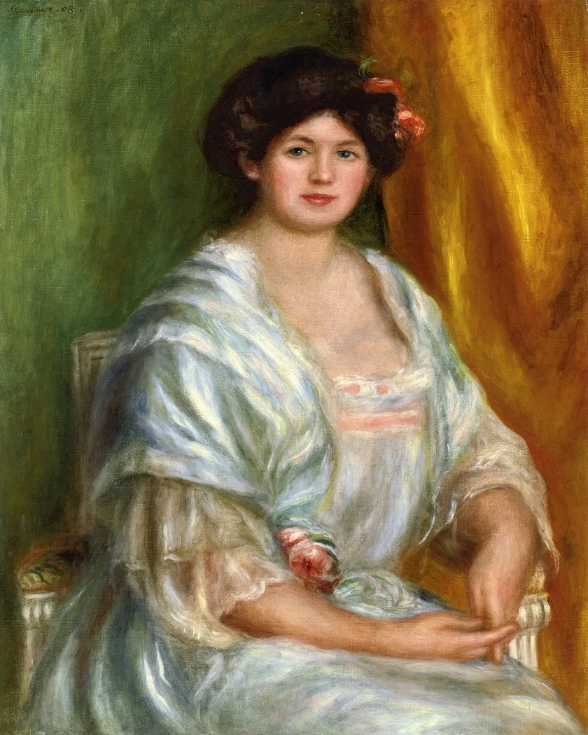 Dark-haired woman with a red flower in her hair, wrapped in a light blue-and-white shawl, seated against green and gold drapery.