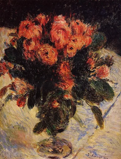 A dense bouquet of coral red roses in a vase against a dark background, set on a light cloth, in deep red, black, and cream