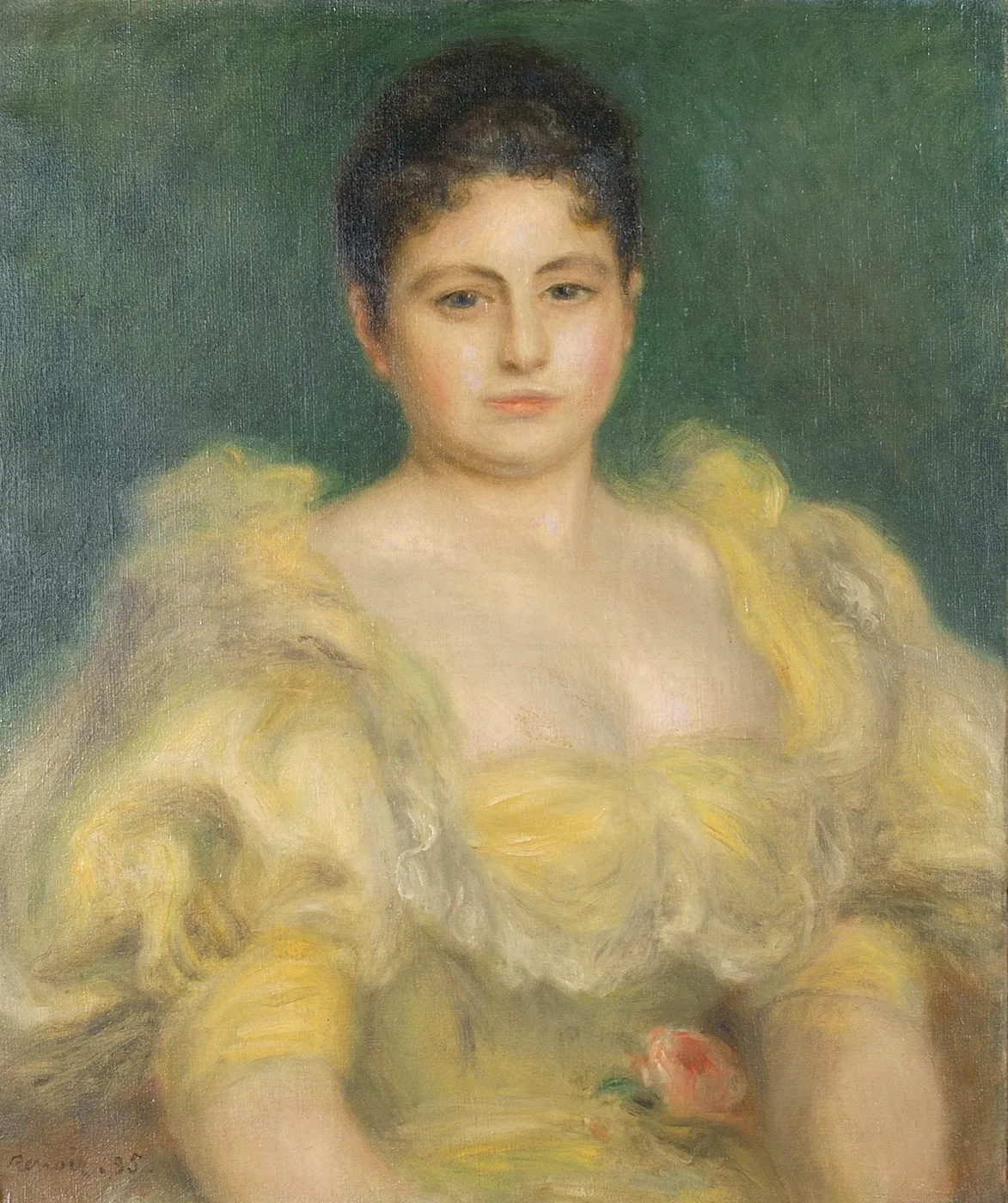 A dark haired woman in a ruffled pale yellow off shoulder gown with a pink rose at her waist is seated against a deep green background