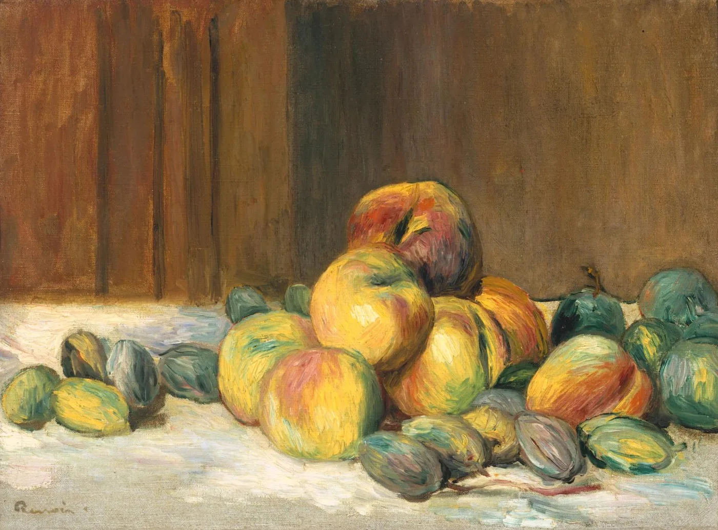 Golden-yellow peaches are heaped with green almond husks on a white cloth against a striped brown wooden background.